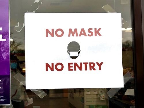No Mask, No Entry sign on glass